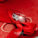 Anel simulado em forma de coração de strass para casal com braços